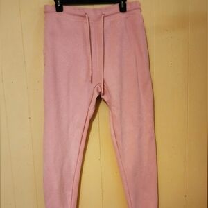 Circle Clothing, Size Small Pink Sweat Pants with pockets in the front.